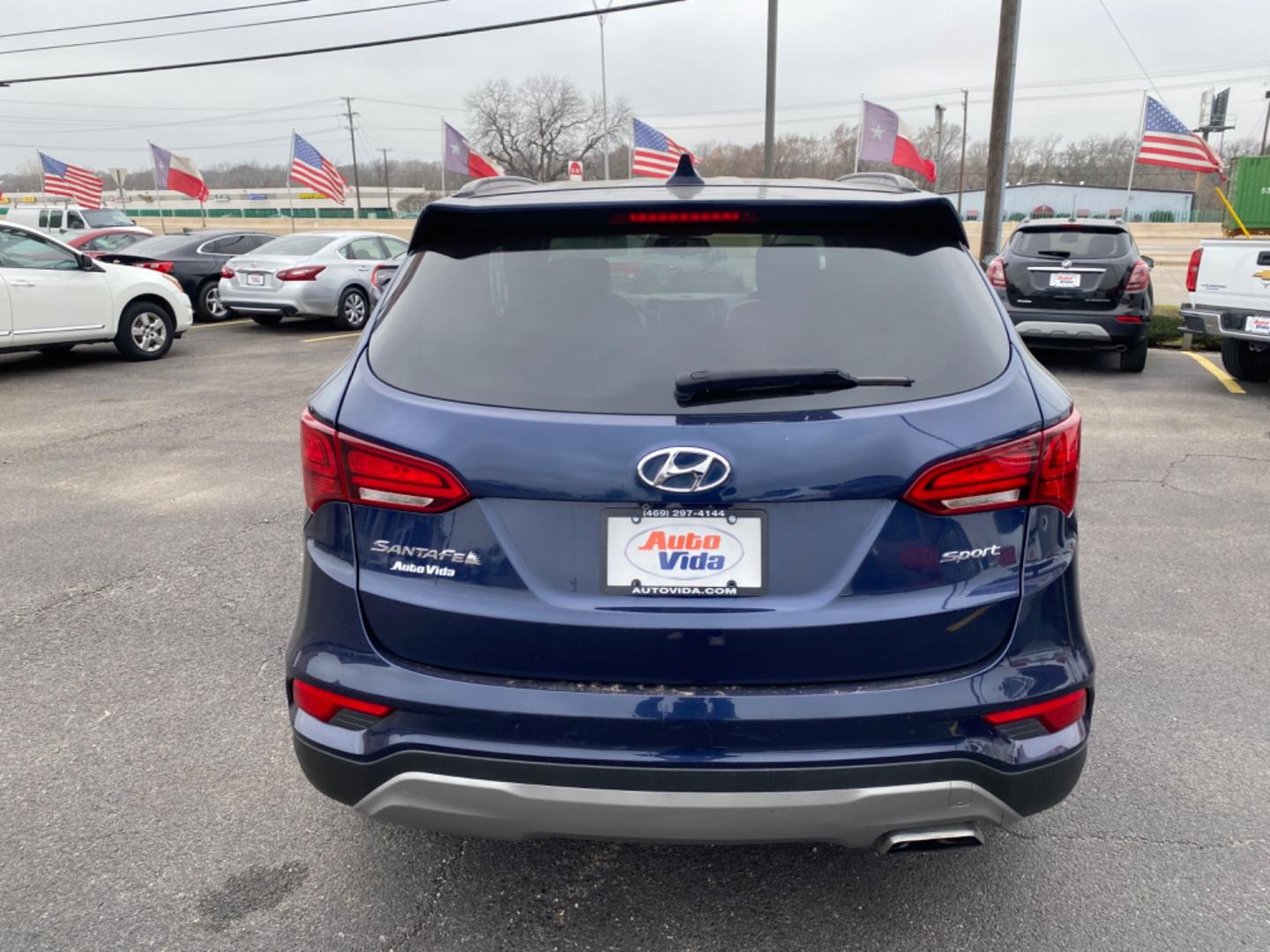 2017 BLUE Hyundai Santa Fe Sport 2.4 FWD (5XYZU3LB6HG) with an 2.4L L4 DOHC 16V engine, 6A transmission, located at 420 I-35E, Lancaster, TX, 75146, (469) 297-4144, 32.593929, -96.823685 - Photo#2